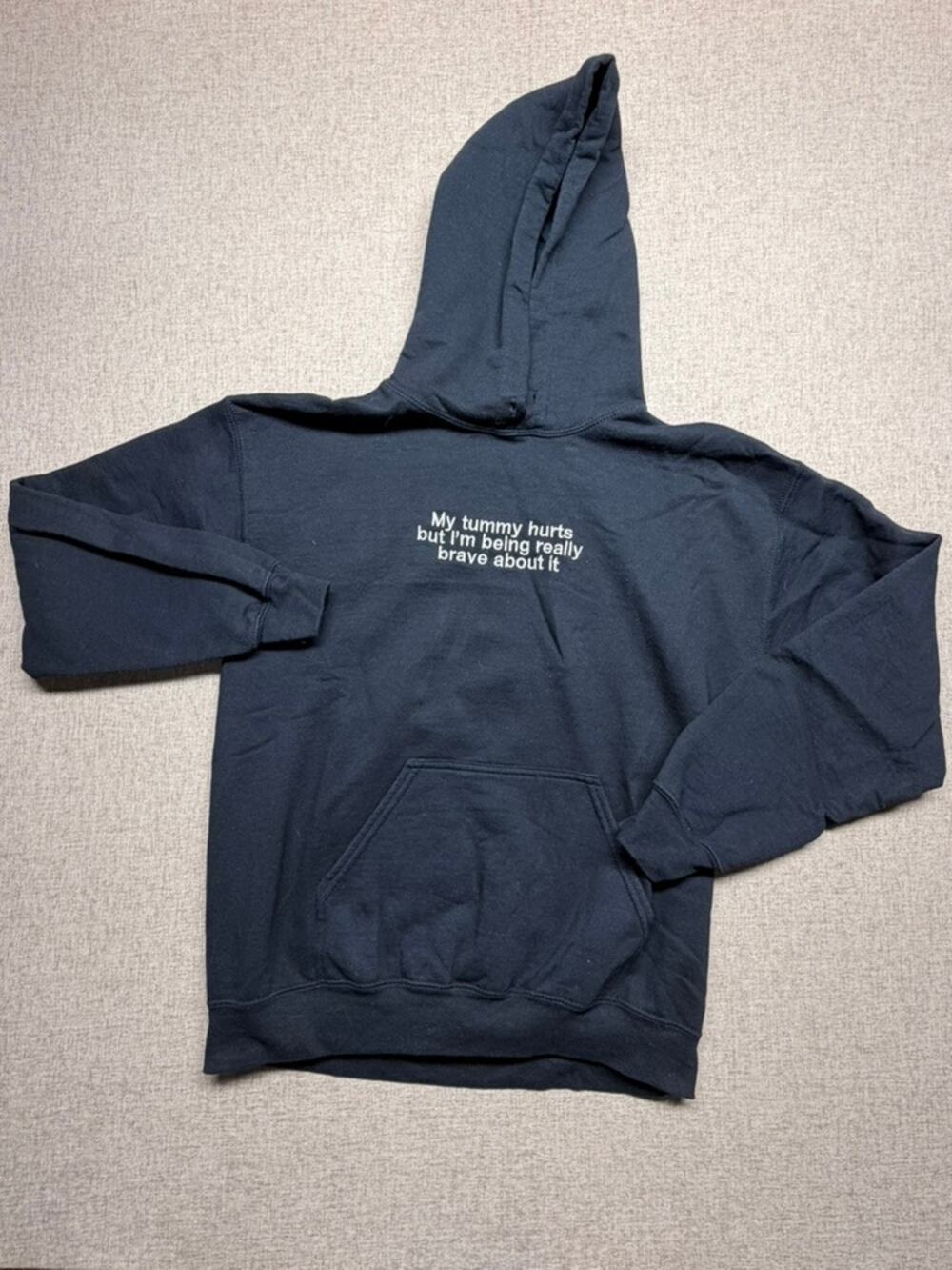 "My Tummy Hurts But I'm Being Really Brave About It" Black Hoodie Medium